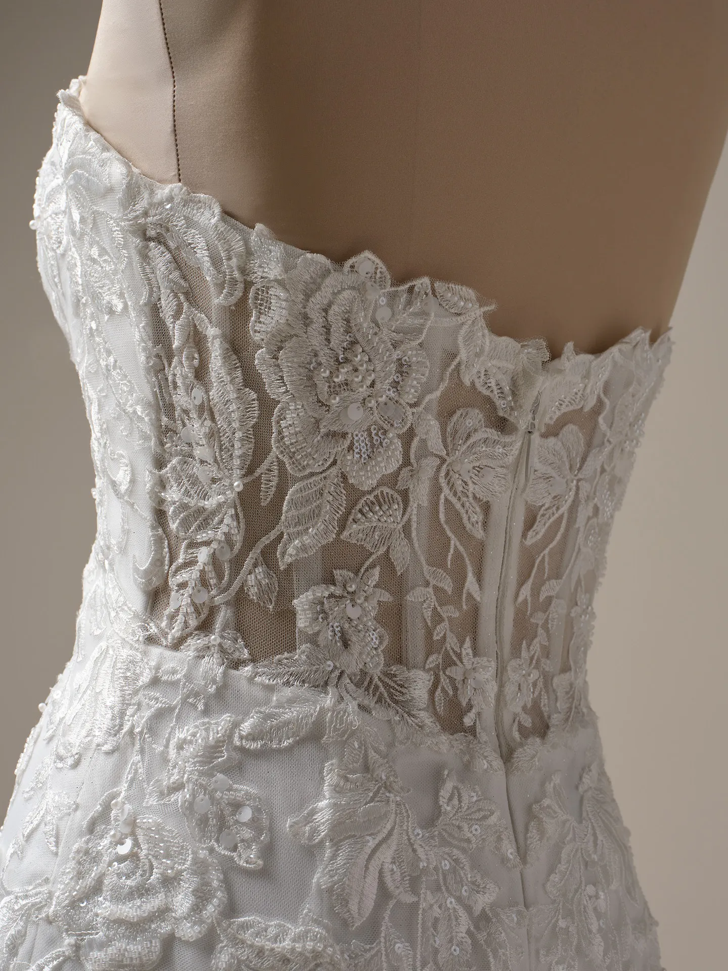 Maggie Sottero Tegan side view, beaded lace detail on mermaid bridal dress.