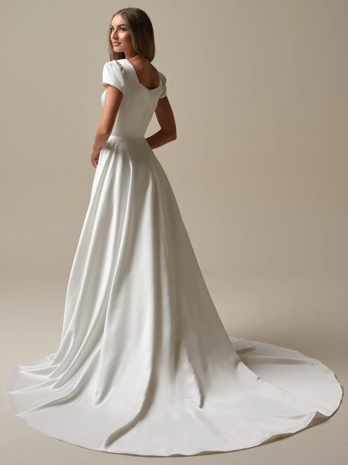 Rebecca Ingram Vesta back view satin ball gown with puff sleeves