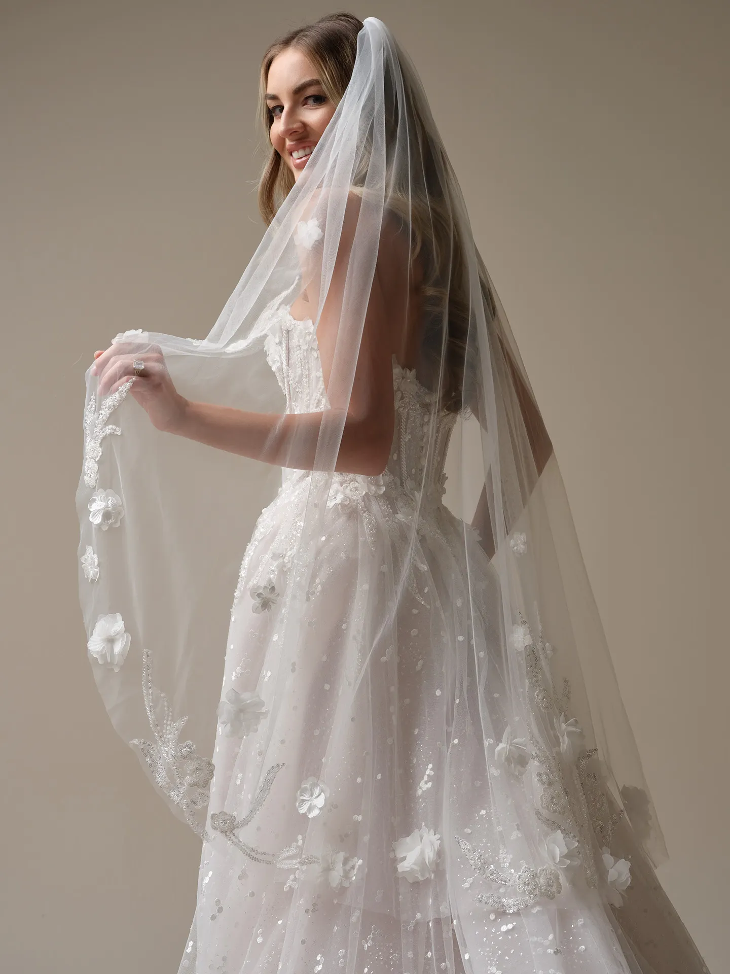 Sottero and Midgley veil with beaded 3-D lace motifs side view