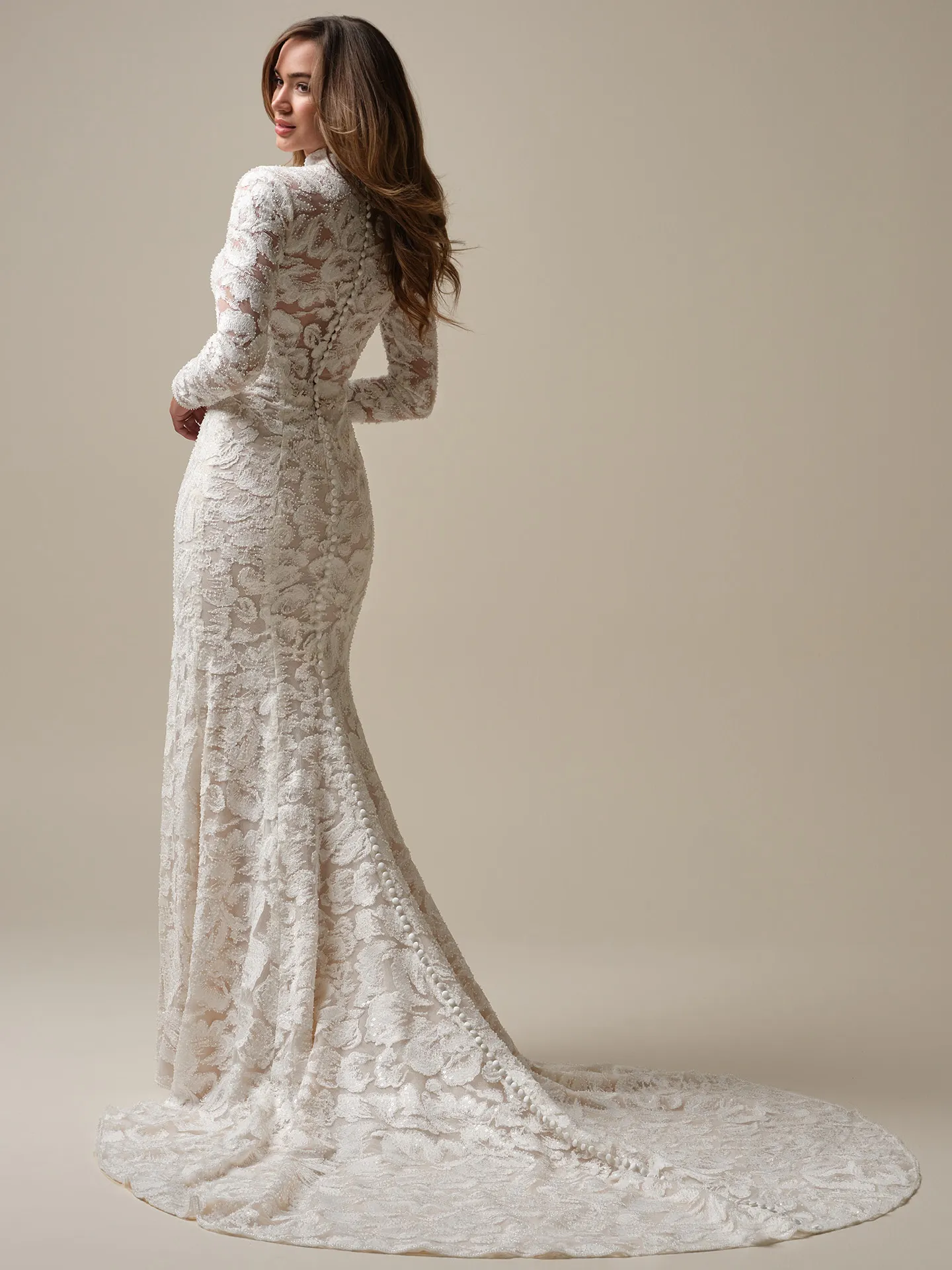 Sottero and Midgley Holland back view, lace sheath bridal gown with long train.