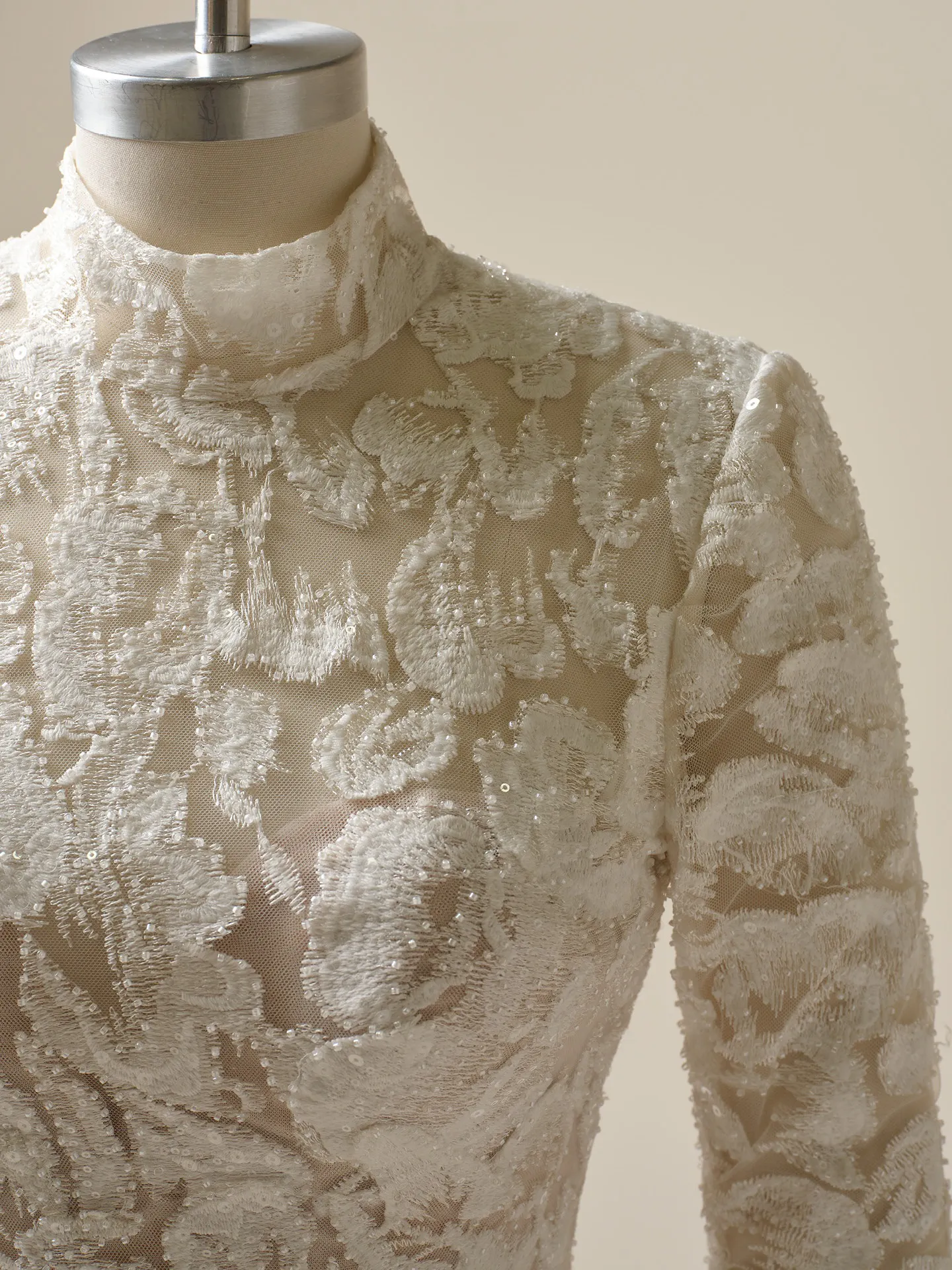 Sottero and Midgley Holland turtleneck illusion lace sheath close-up