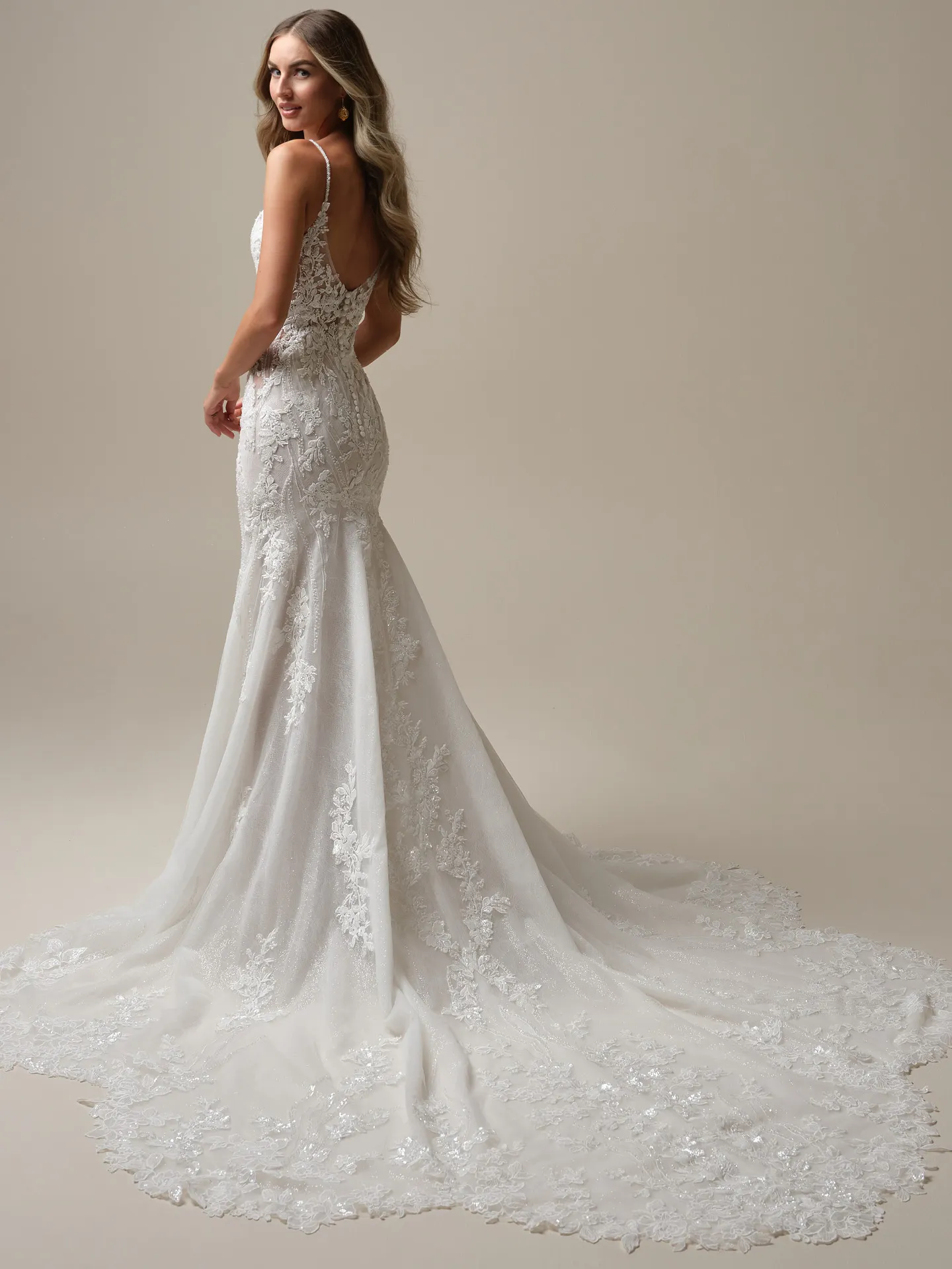 Sottero and Midgley Lina back view, lace mermaid gown with long train.
