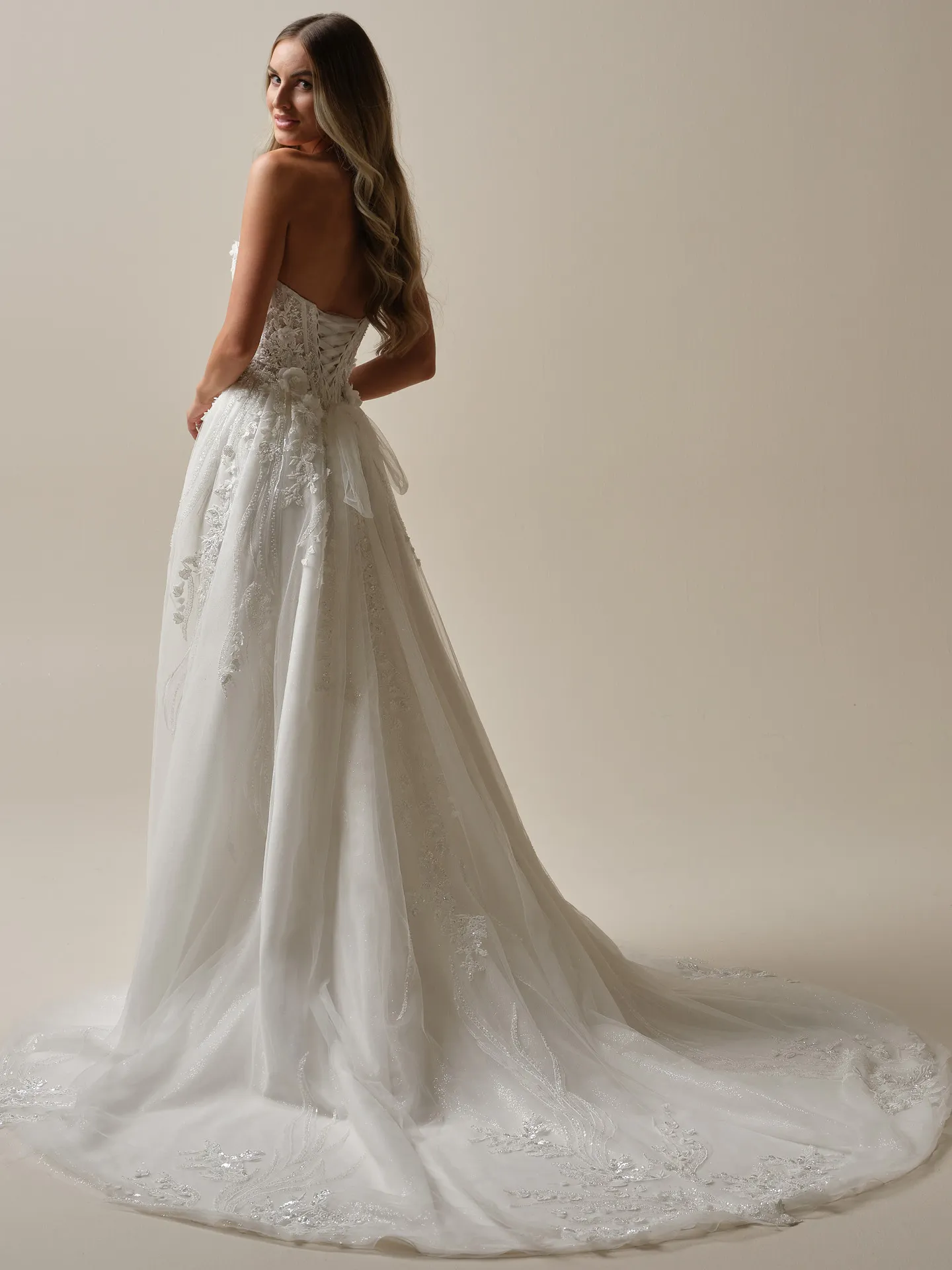 Logan lace-up beaded A-line wedding dress back view Maggie Sottero