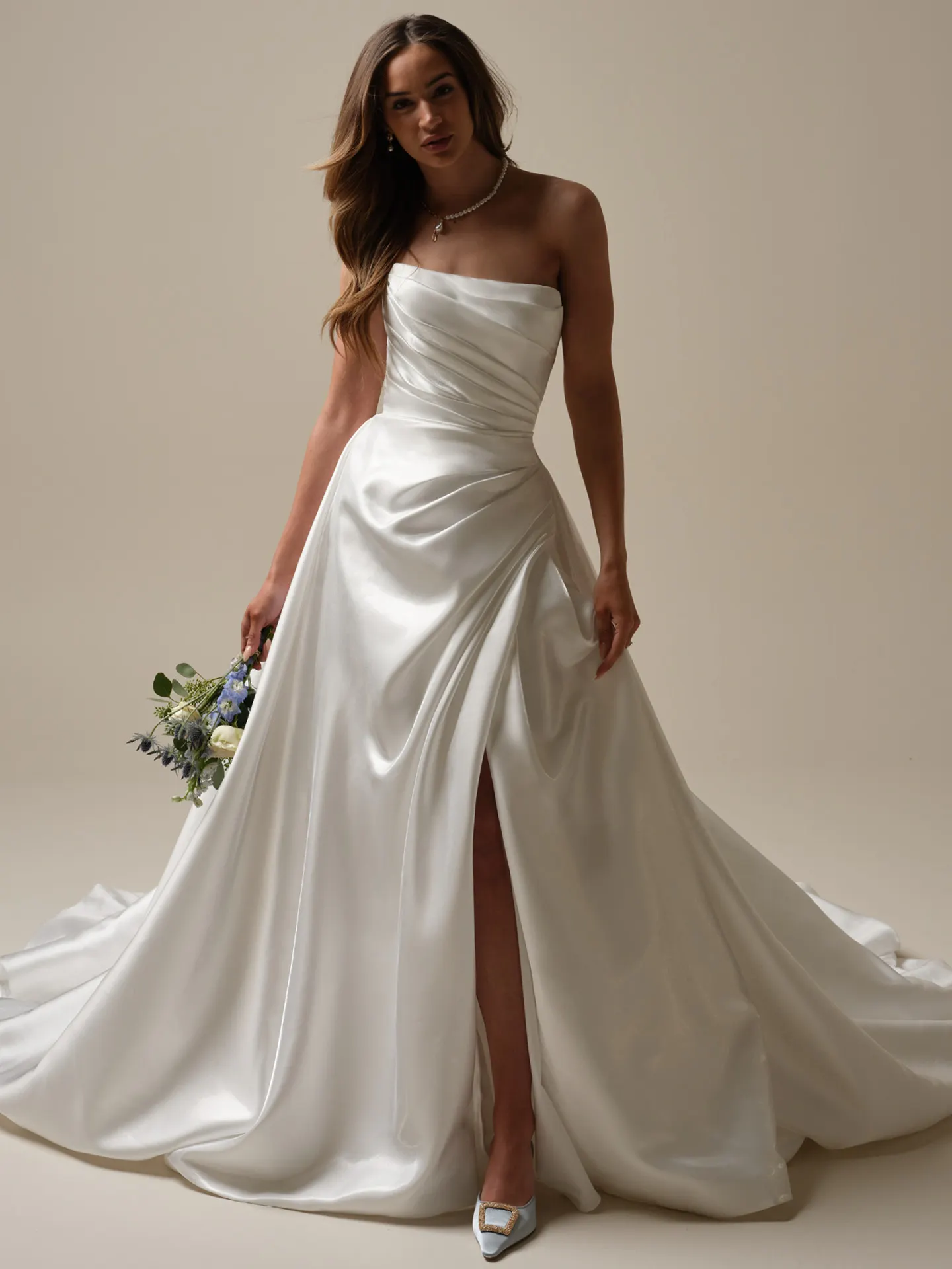 Sottero and Midgley Mirabella gown front view with pleated A-line and thigh-high slit