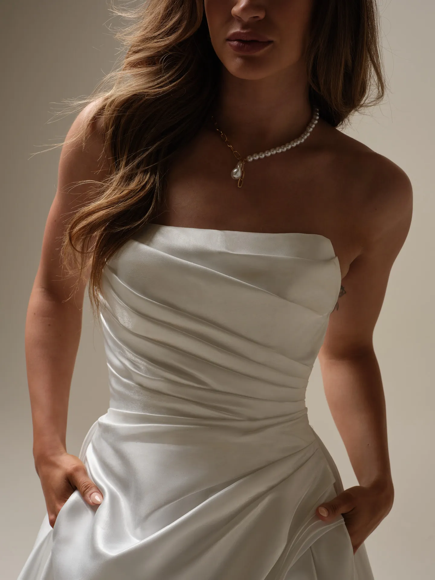 Sottero and Midgley Mirabella asymmetrical pleated A-line wedding gown front view