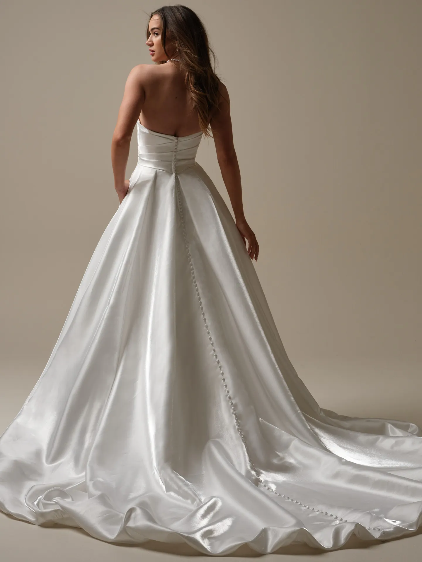 Sottero and Midgley Mirabella back view, asymmetrical pleated A-line wedding gown
