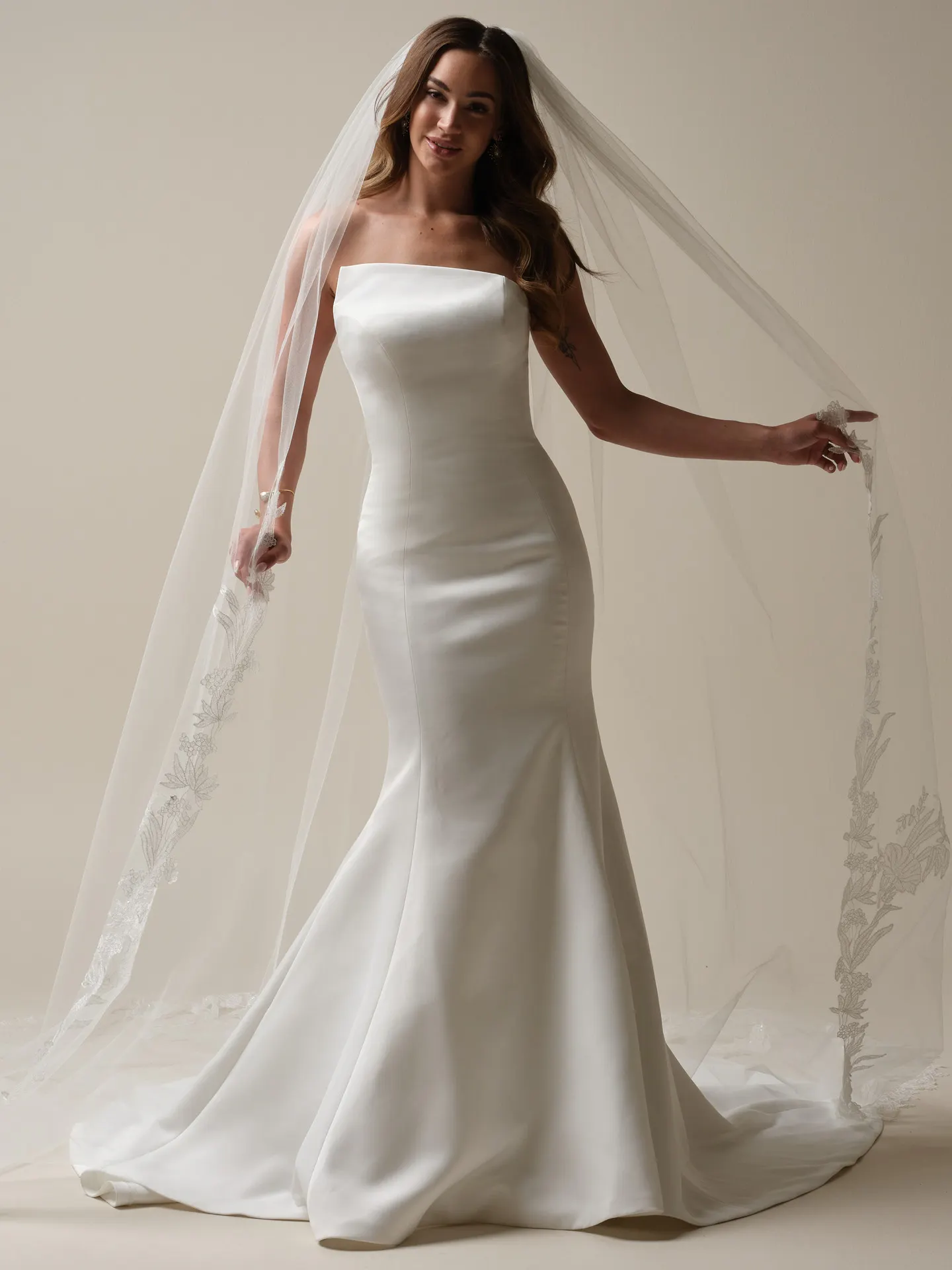 Sottero and Midgley sheath front view with Nesrine royal length veil