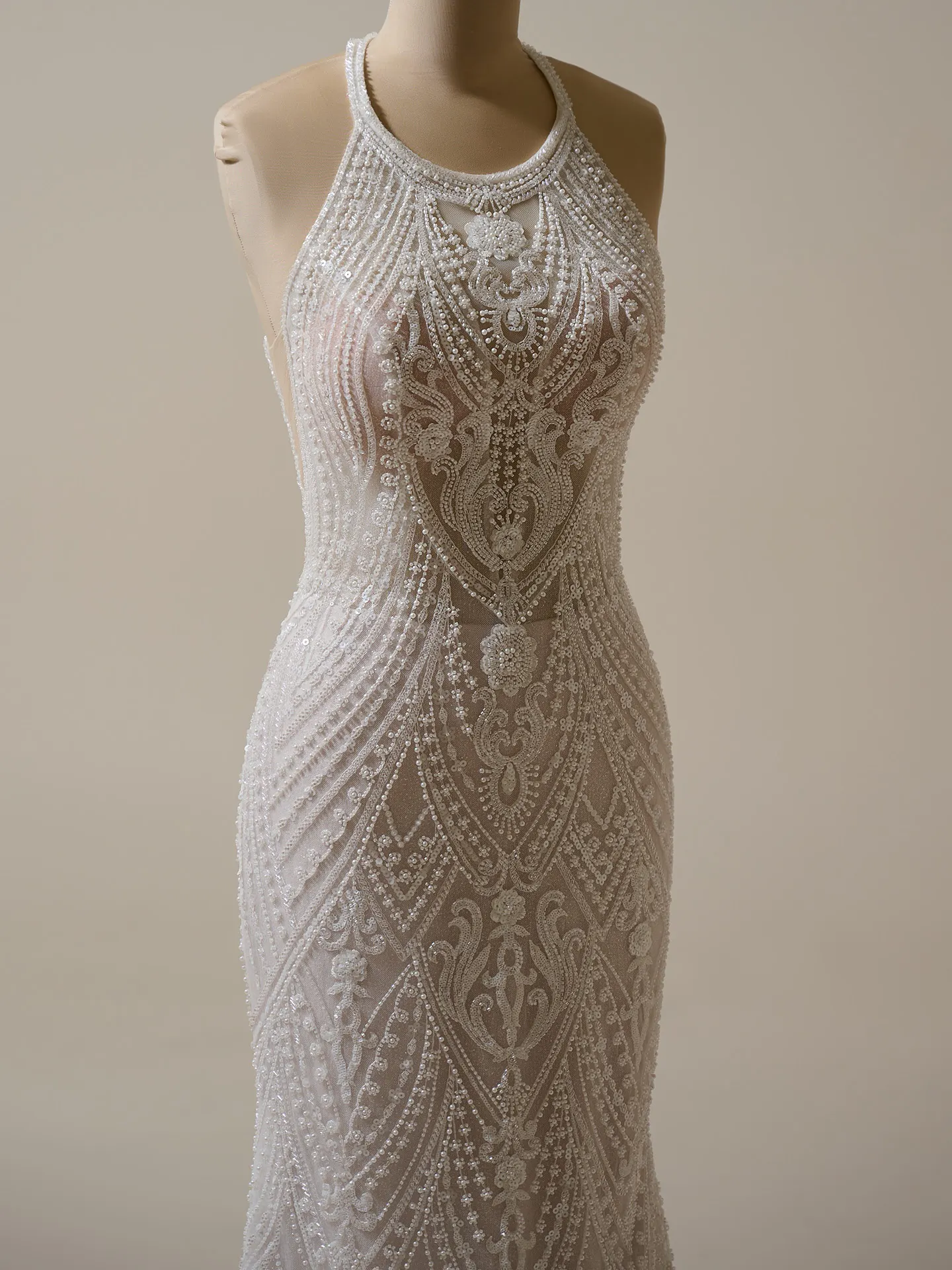 Maggie Sottero Rhett halter neck beaded sheath gown close-up