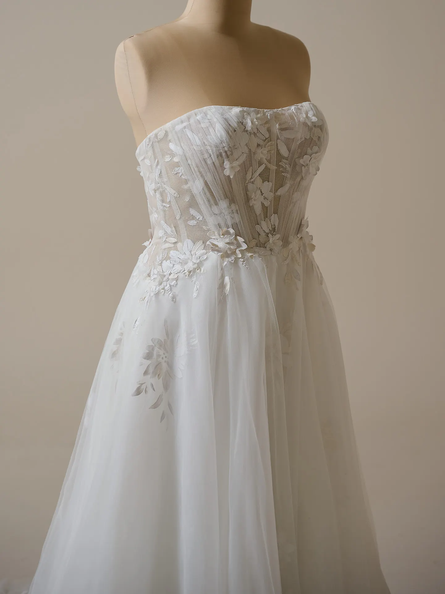 Maggie Sottero A-line gown, floral detail, front view