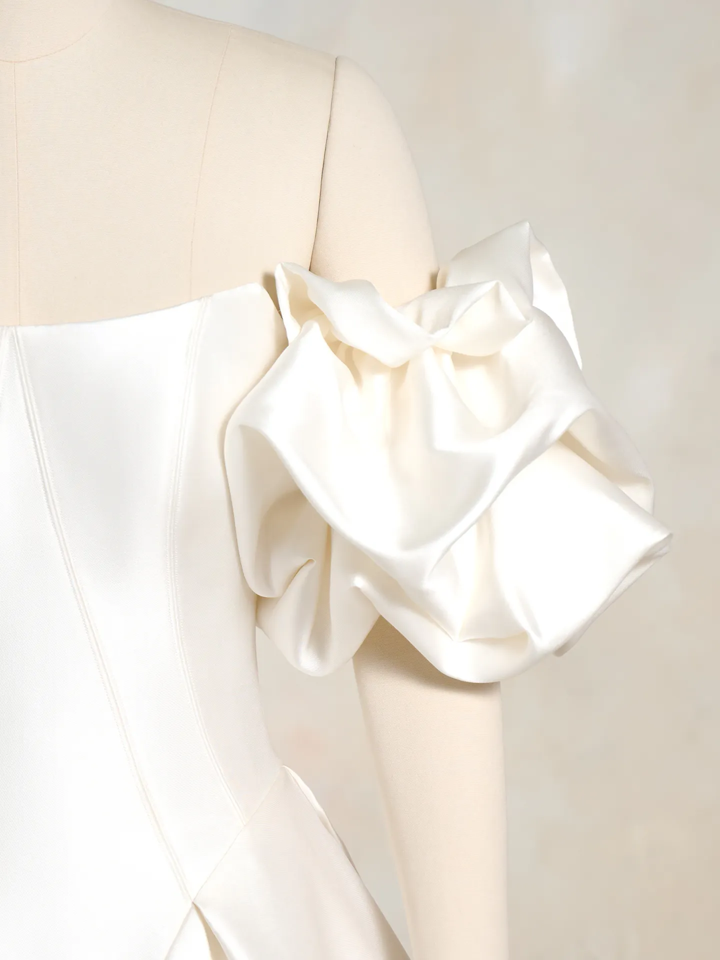 Maggie Sottero satin puff armband, side view.
