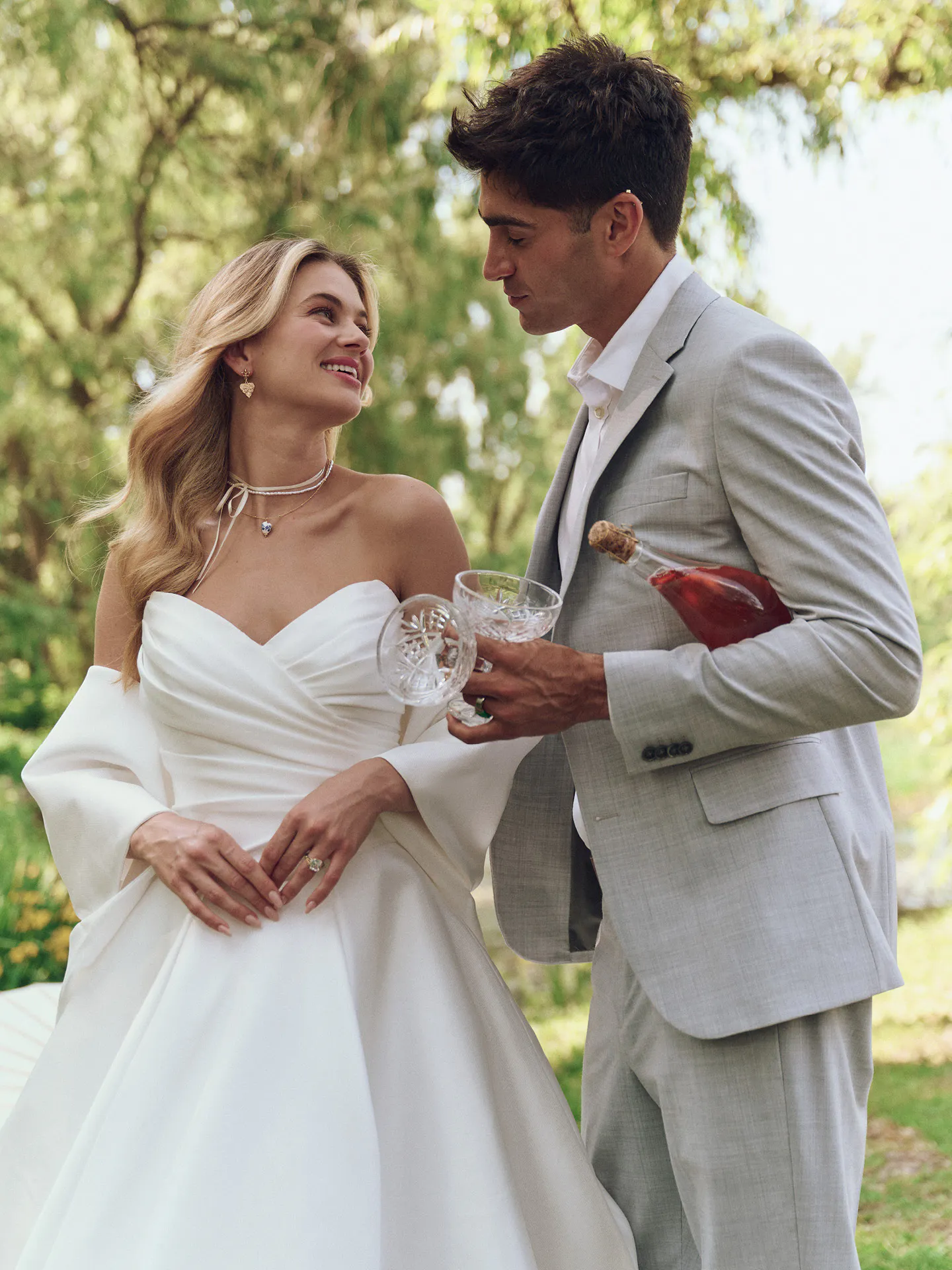 Maggie Sottero Aubrielle front view satin ball gown dress in outdoor setting