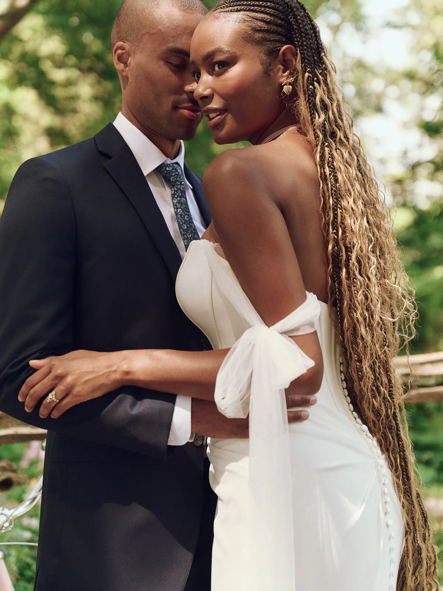 Maggie Sottero Jace side view wedding dress with exposed boning and crepe sheath style