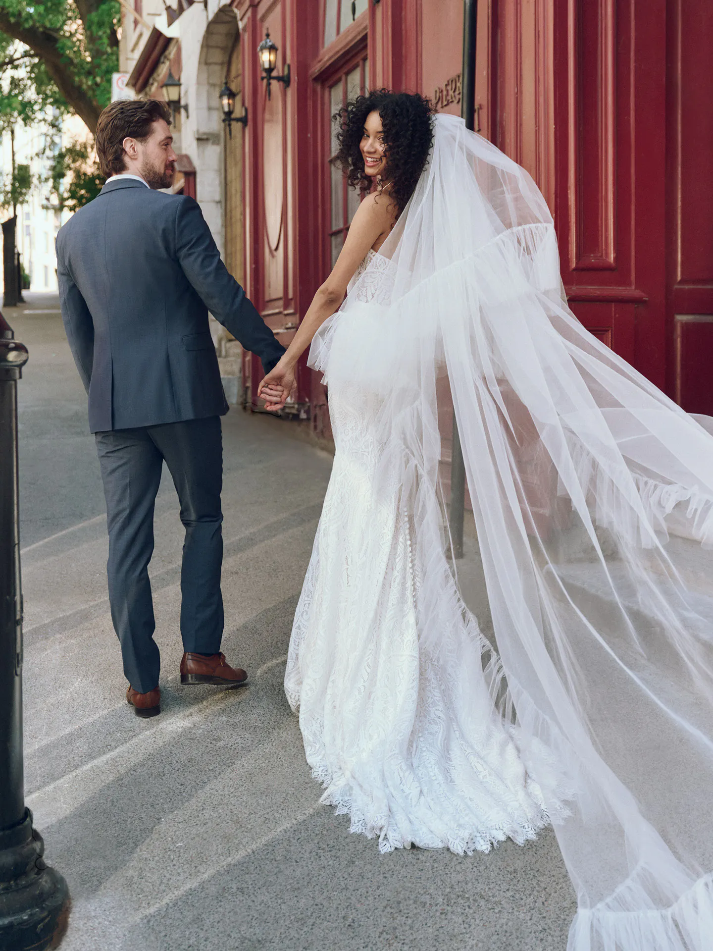 Maggie Sottero Berkeley back view lace sheath bridal dress with veil