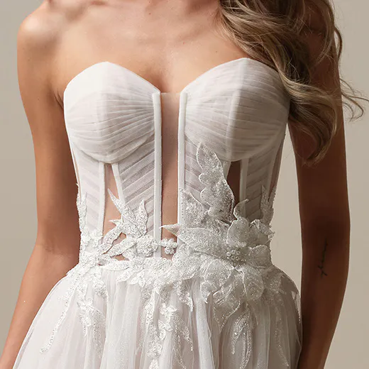 Maggie Sottero Arden front view, illusion pleated A-line wedding dress with floral details
