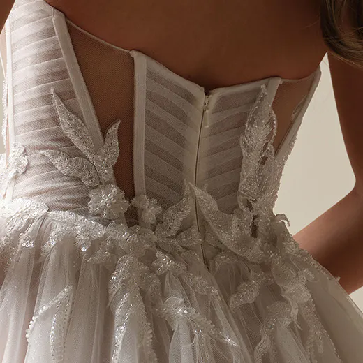 Arden Illusion Pleated A-line wedding dress back view, Maggie Sottero.