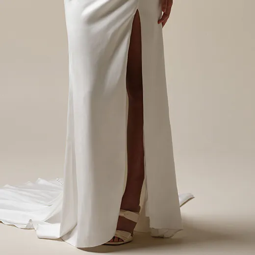 Maggie Sottero Camille front view, satin sheath dress with high slit.