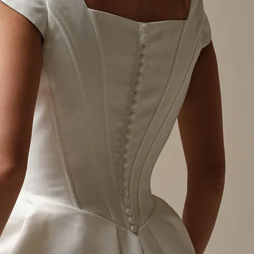Maggie Sottero Derrick Leigh back view with button detail