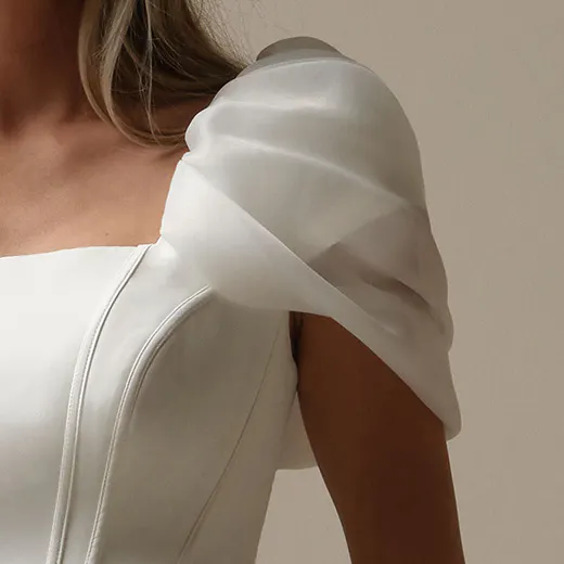 Maggie Sottero Derrick Leigh bodice detail with sheer puff sleeve, side view