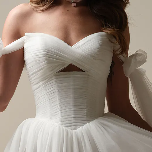 Maggie Sottero Evan pleated keyhole ball gown front view