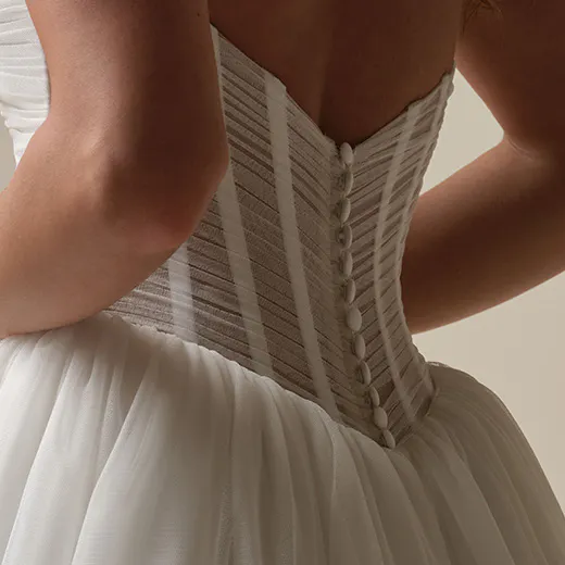 Maggie Sottero Evan back view corset detail with buttons and pleats ball gown wedding dress