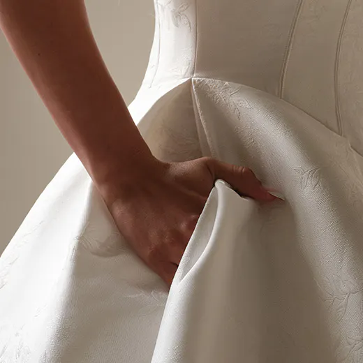 Maggie Sottero Fortune Marie detail showing jacquard texture and princess ball gown fabric