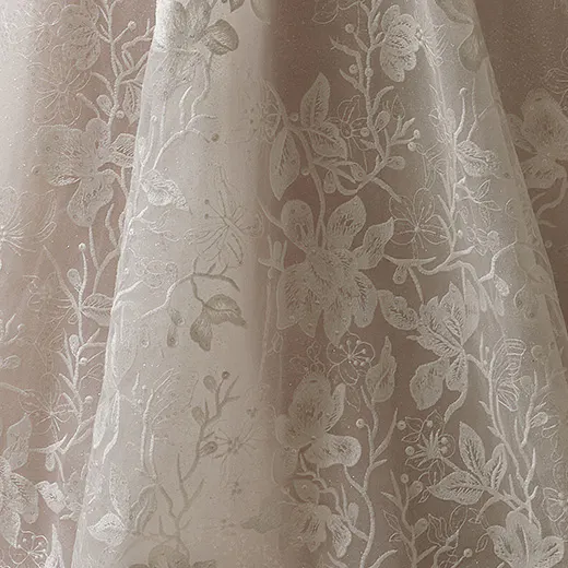 Maggie Sottero Jerrica beaded floral lace A-line dress detail.