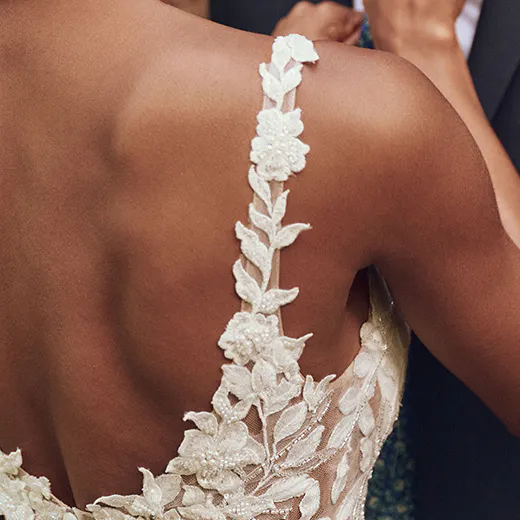Keegan Glittering Illusion Mermaid Wedding Gown back view with floral lace straps