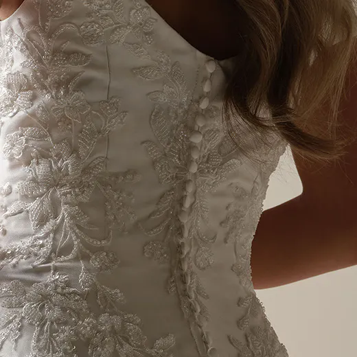 Loreen fit-and-flare with floral lace button detail by Maggie Sottero
