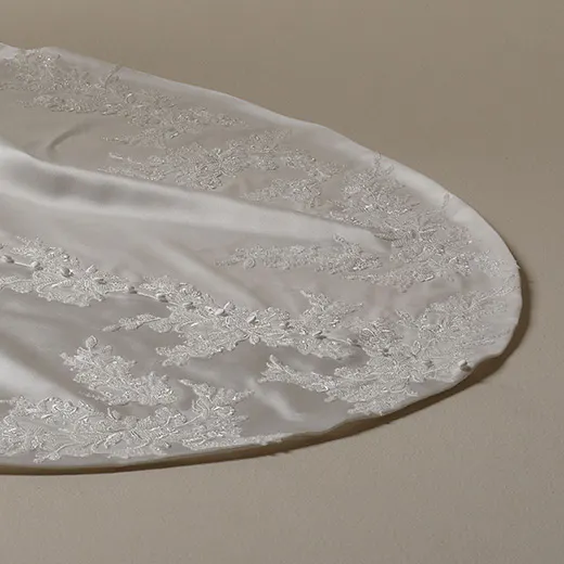 Maggie Sottero Loreen satin fit-and-flare bridal train with lace detail