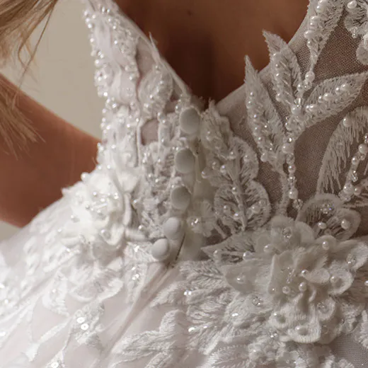 Maggie Sottero Magnolia back view, 3D lace detail, sparkling A-line wedding dress.