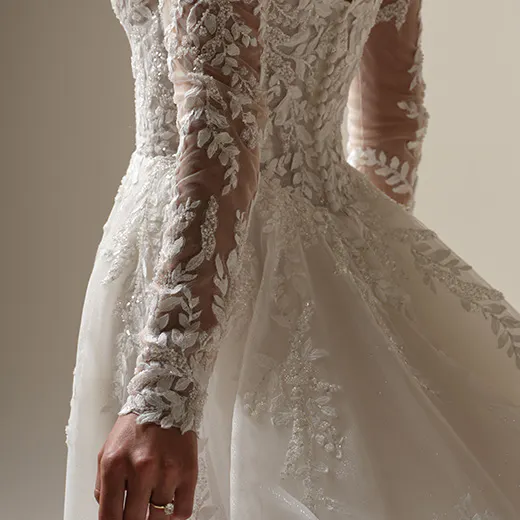 Rita A-line bridal gown back view with lace sleeves by Maggie Sottero
