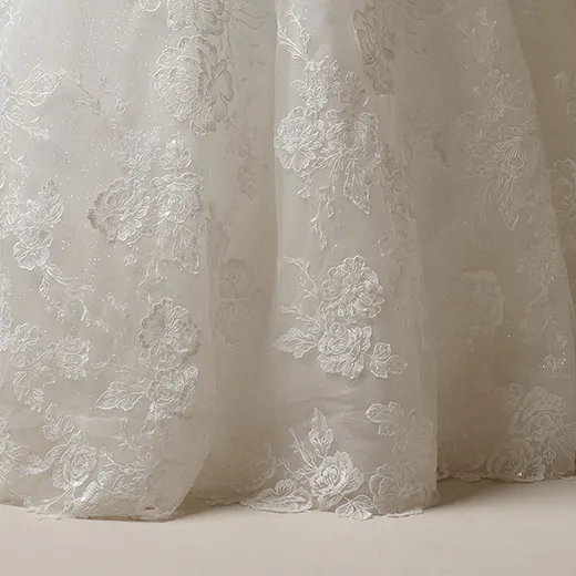 Maggie Sottero Skylar lace detail on A-line bridal gown skirt