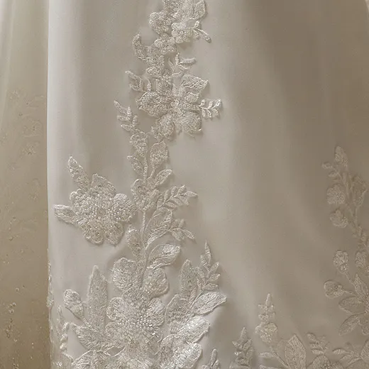 Maggie Sottero Yara floral lace detail on crepe fabric