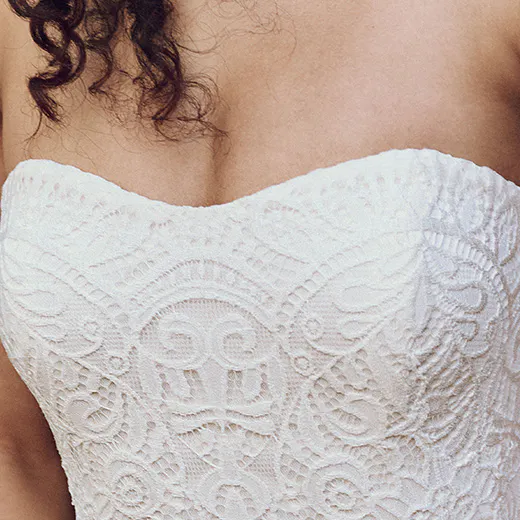 Maggie Sottero Berkeley front view, unembellished lace sheath bridal dress.
