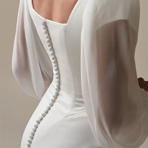 Maggie Sottero Jorie back view with button detail and sheer sleeves