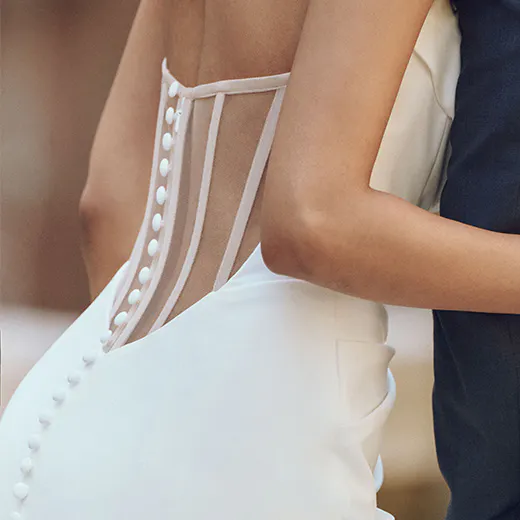 Maggie Sottero Kailani back view with button detail and basque waist.