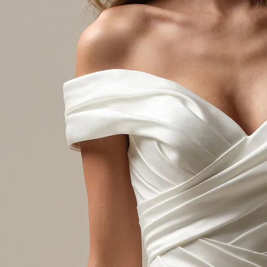 Maggie Sottero Latoya off-shoulder asymmetrical satin dress front view