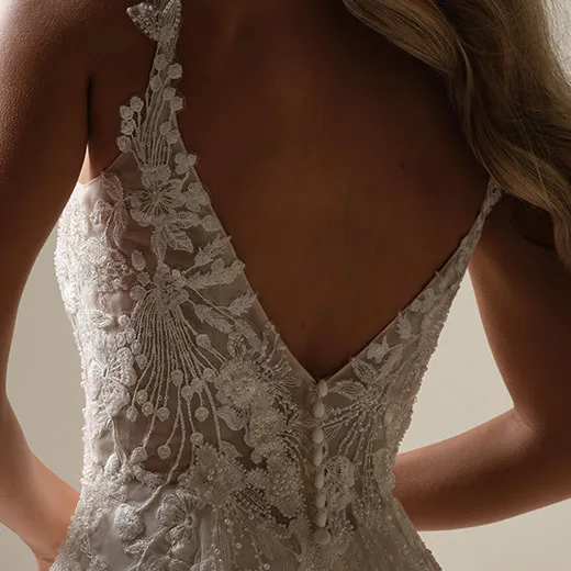 Rebecca Ingram Maple back view beaded lace V-neck A-line bridal gown.
