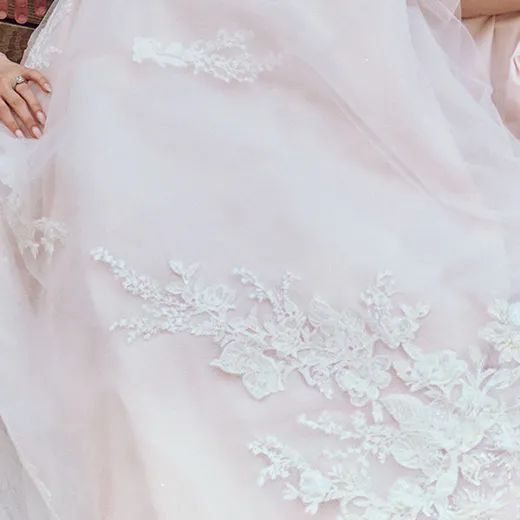 Rickie halter neck lace A-line gown with floral detail, Maggie Sottero.