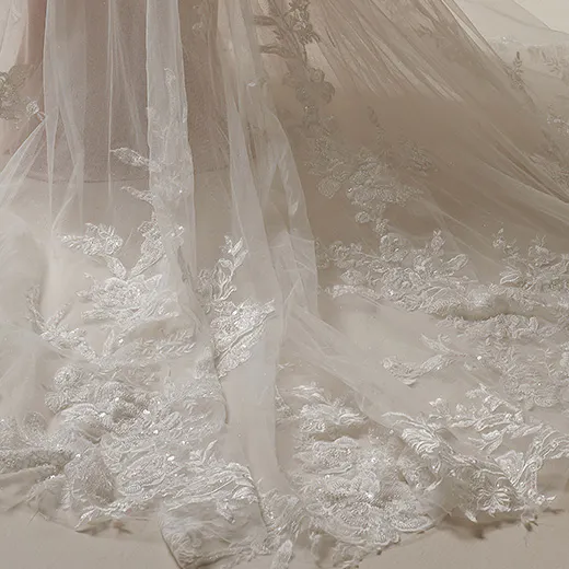 Tegan beaded lace mermaid dress train detail Maggie Sottero
