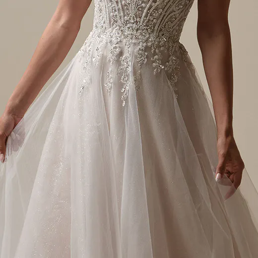 Maggie Sottero Yvette front view shimmering organza wedding gown with beaded bodice