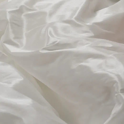 Ruffled taffeta fabric, close-up view, Maggie Sottero wedding dress.