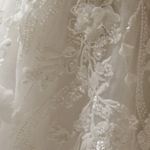 Logan lace-up beaded A-line wedding dress detail, Maggie Sottero.