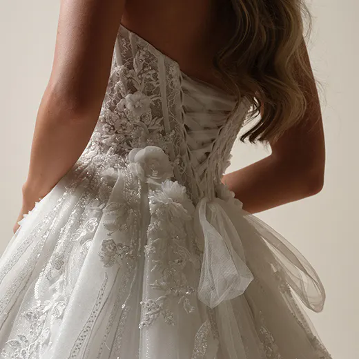 Maggie Sottero Logan lace-up back view, beaded floral A-line wedding dress.
