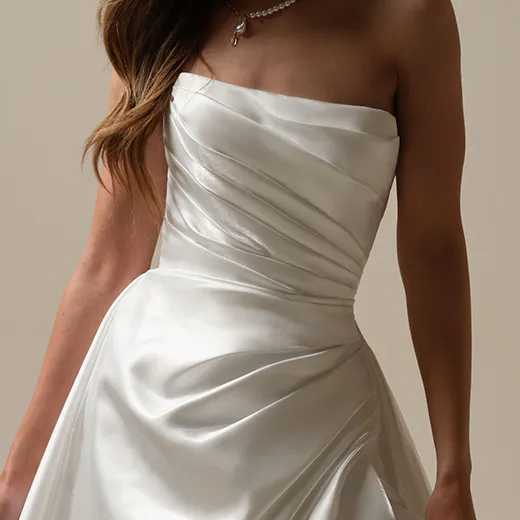 Sottero and Midgley Mirabella front view, asymmetrical pleated A-line wedding gown.