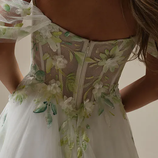 Maggie Sottero back view floral A-line gown with sheer floral bodice detailing