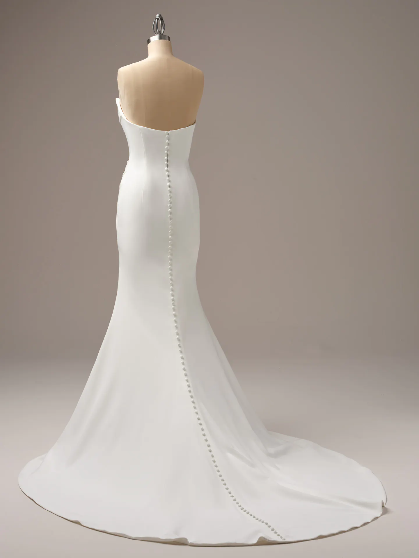 Kailani crepe gown back view with basque waist and cowl neckline on mannequin