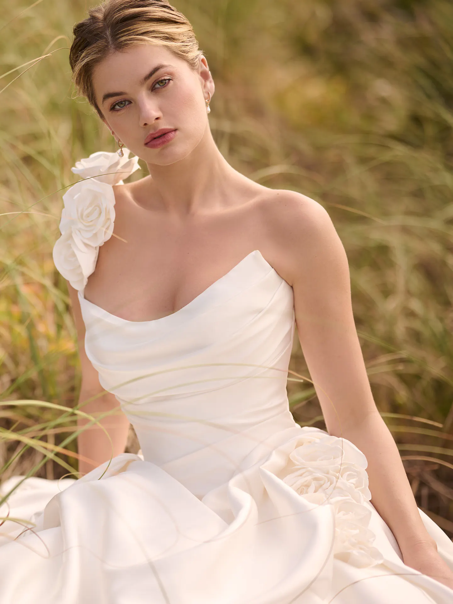 Maggie Sottero Antoinette front view ballgown with -D floral detail in natural setting