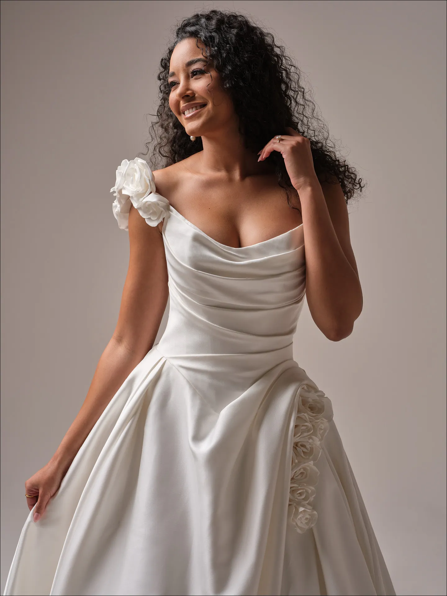 Maggie Sottero Antoinette front view, white ballgown with -D floral shoulder detail