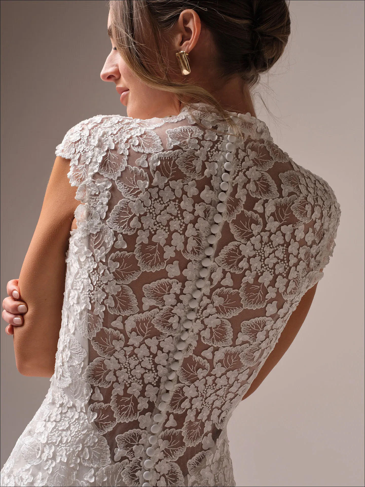 Maggie Sottero Auburn lace back view with cap sleeves and floral button detail